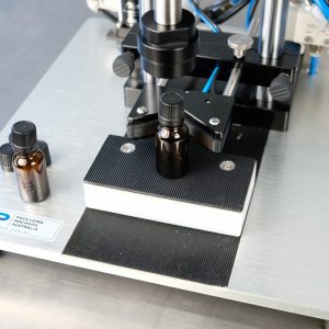 capping small container with tamper evident caps