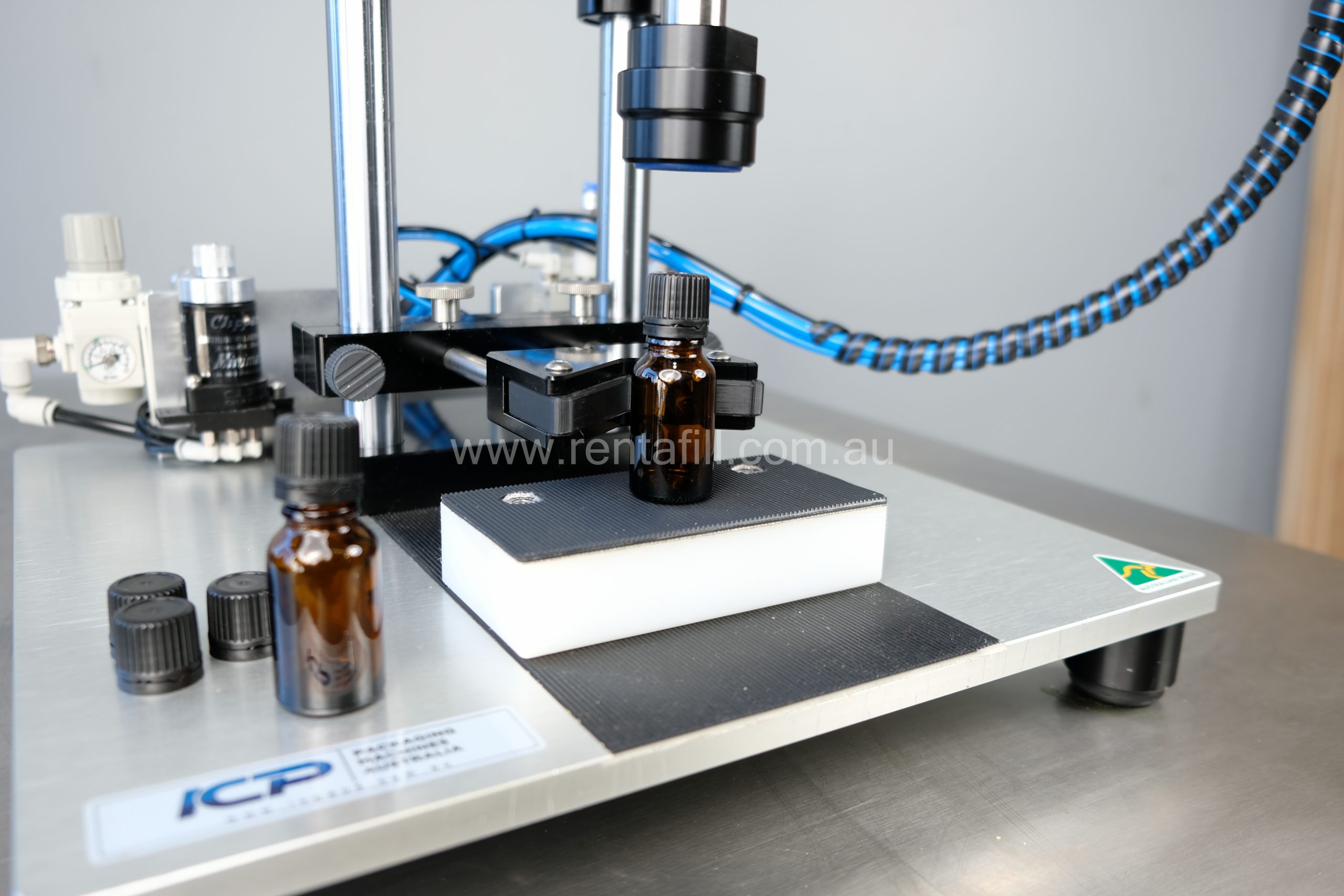 capping small container with tamper evident caps