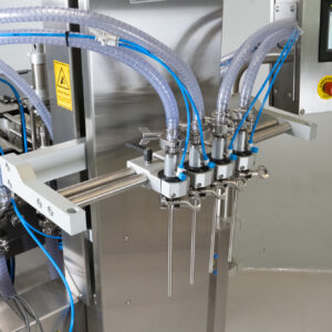 Pinch valve nozzles for auto fillers