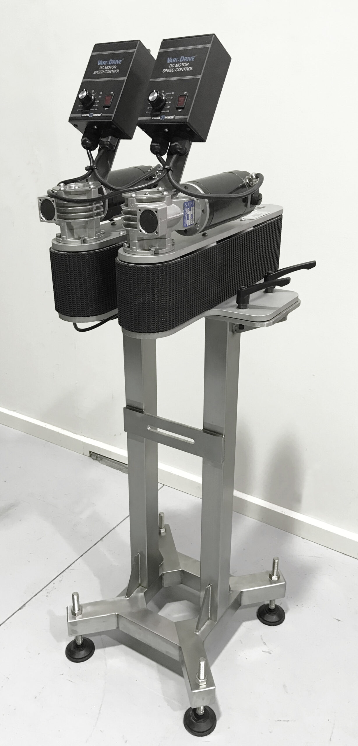 Bottomless conveyor by Kleintek used for underside inkjet coding of bottles.